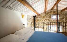 ...und das gemütliche Doppelbett unter den Balken im del Forno.